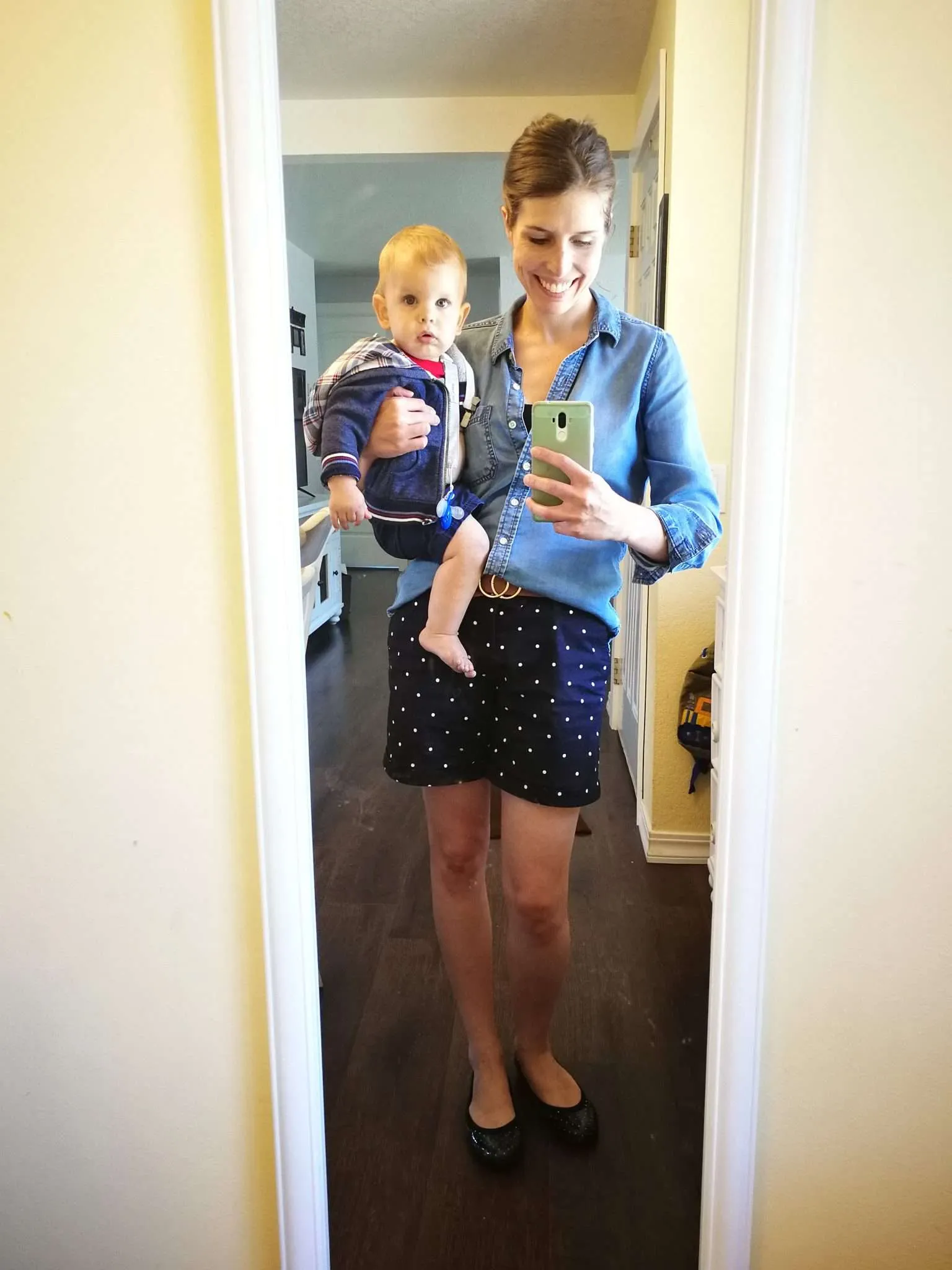 How to do a front tuck on chambray denim button-down shirt with belt and shorts.