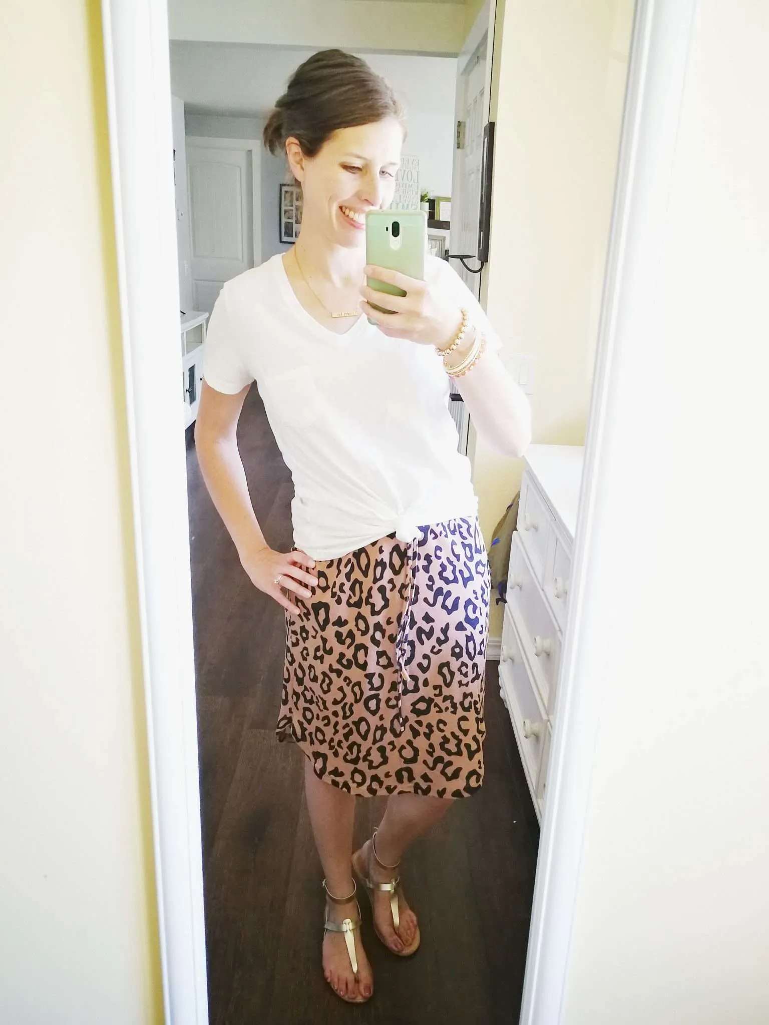 How to wear a long oversized baggy shirt with a skirt without looking frumpy.