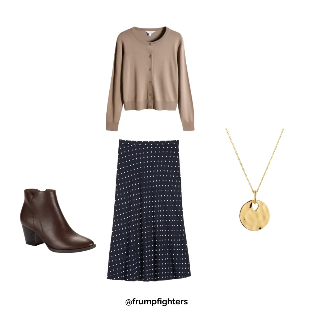 Tan cardigan, navy polka-dot skirt, ankle boots, and gold pendant necklace styled as a cute fall teacher outfit.